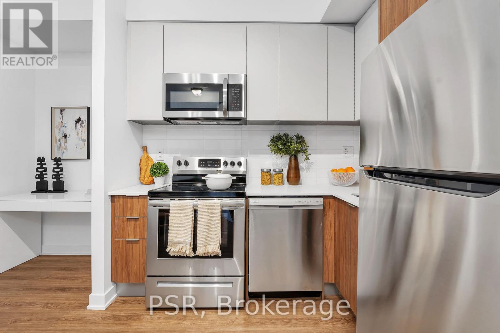 110 - 41 Danforth Road, Toronto, ON - Indoor Photo Showing Kitchen With Stainless Steel Kitchen