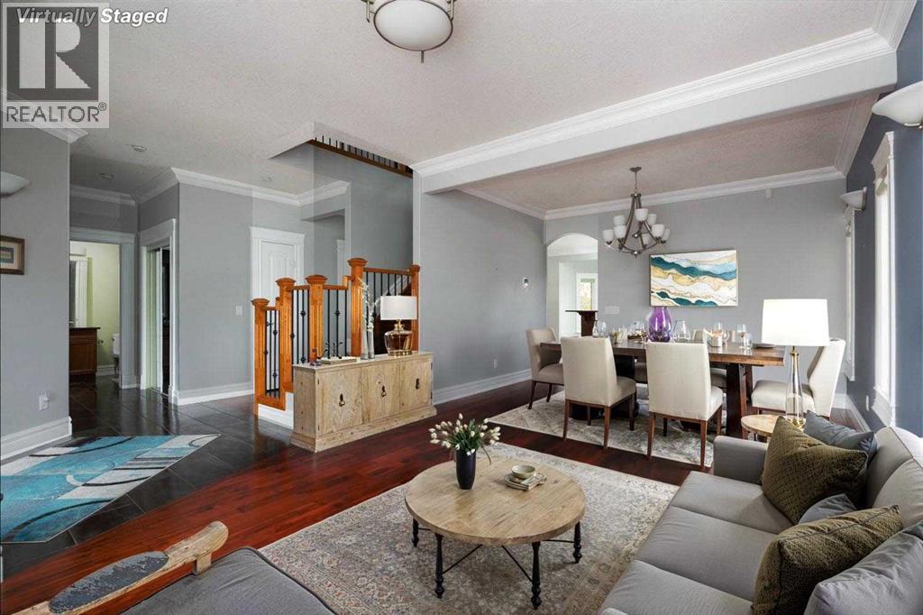 Formal dining main floor virtually staged - 145 Fireweed Crescent, Fort Mcmurray, AB - Indoor Photo Showing Living Room