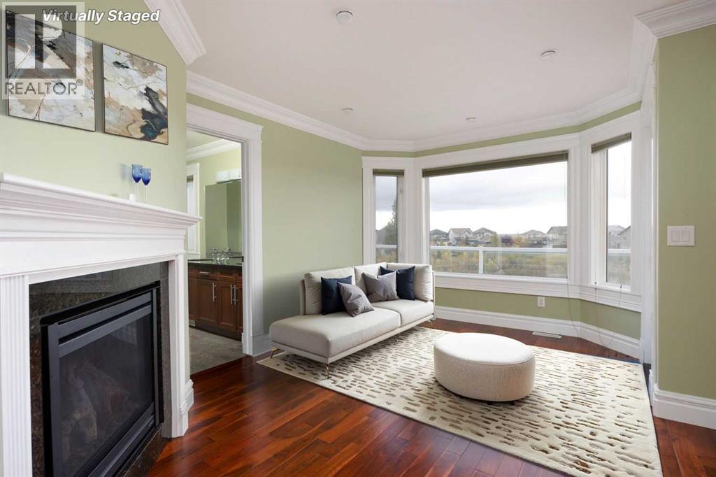 Primary bedroom Virtyally staged - 145 Fireweed Crescent, Fort Mcmurray, AB - Indoor Photo Showing Living Room With Fireplace