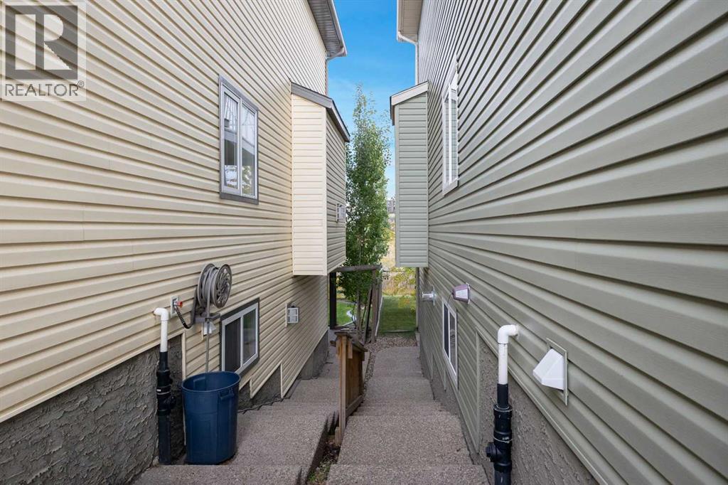 2nd aggregate exposed staircase to backyard - 145 Fireweed Crescent, Fort Mcmurray, AB - Outdoor With Exterior