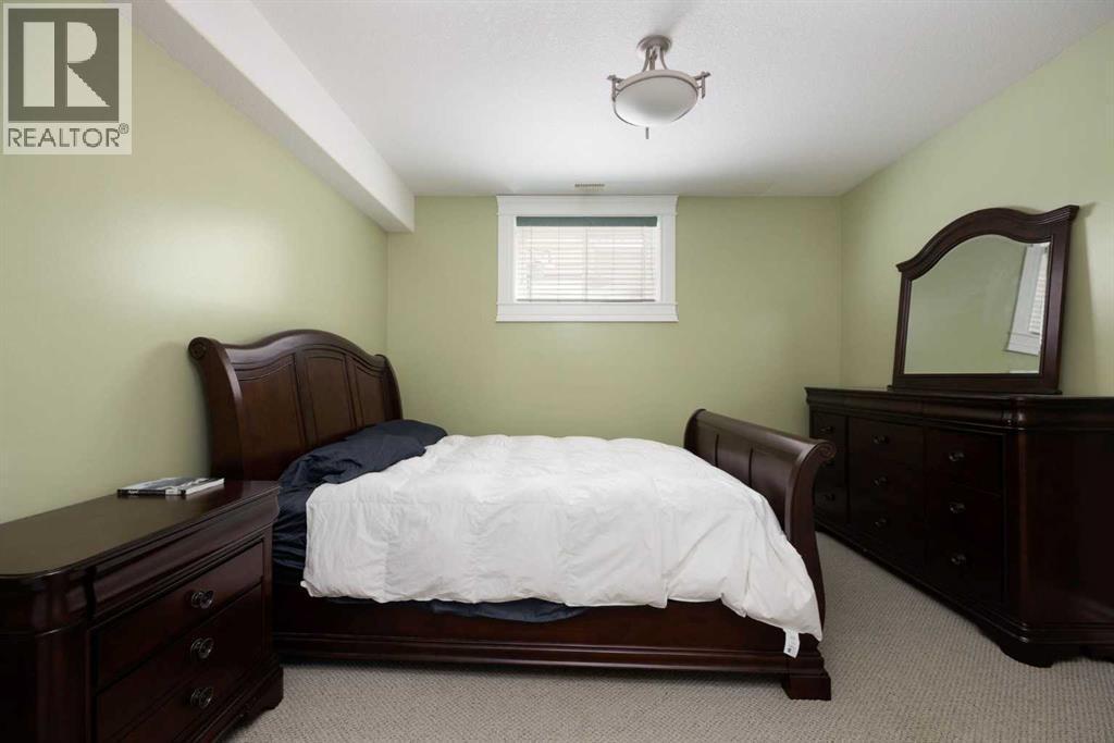 Primary bed suite - 145 Fireweed Crescent, Fort Mcmurray, AB - Indoor Photo Showing Bedroom