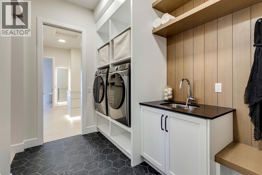 11 Normandy Lane Sw, Calgary, AB - Indoor Photo Showing Laundry Room