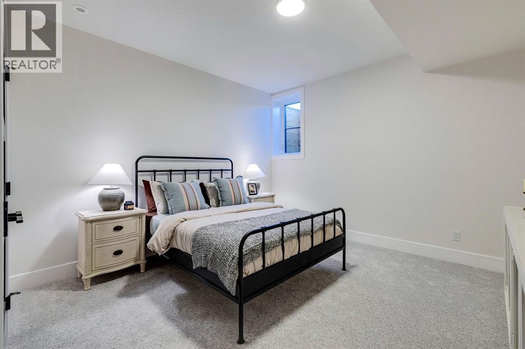 11 Normandy Lane Sw, Calgary, AB - Indoor Photo Showing Bedroom