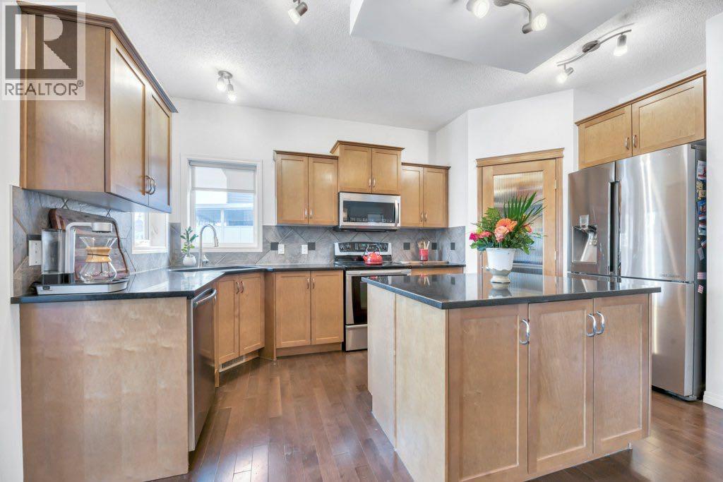 360 Parkmere Green, Chestermere, AB - Indoor Photo Showing Kitchen With Stainless Steel Kitchen