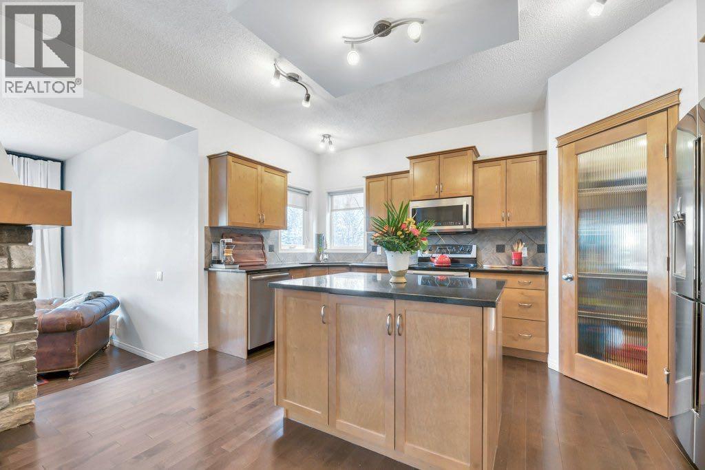 360 Parkmere Green, Chestermere, AB - Indoor Photo Showing Kitchen With Stainless Steel Kitchen