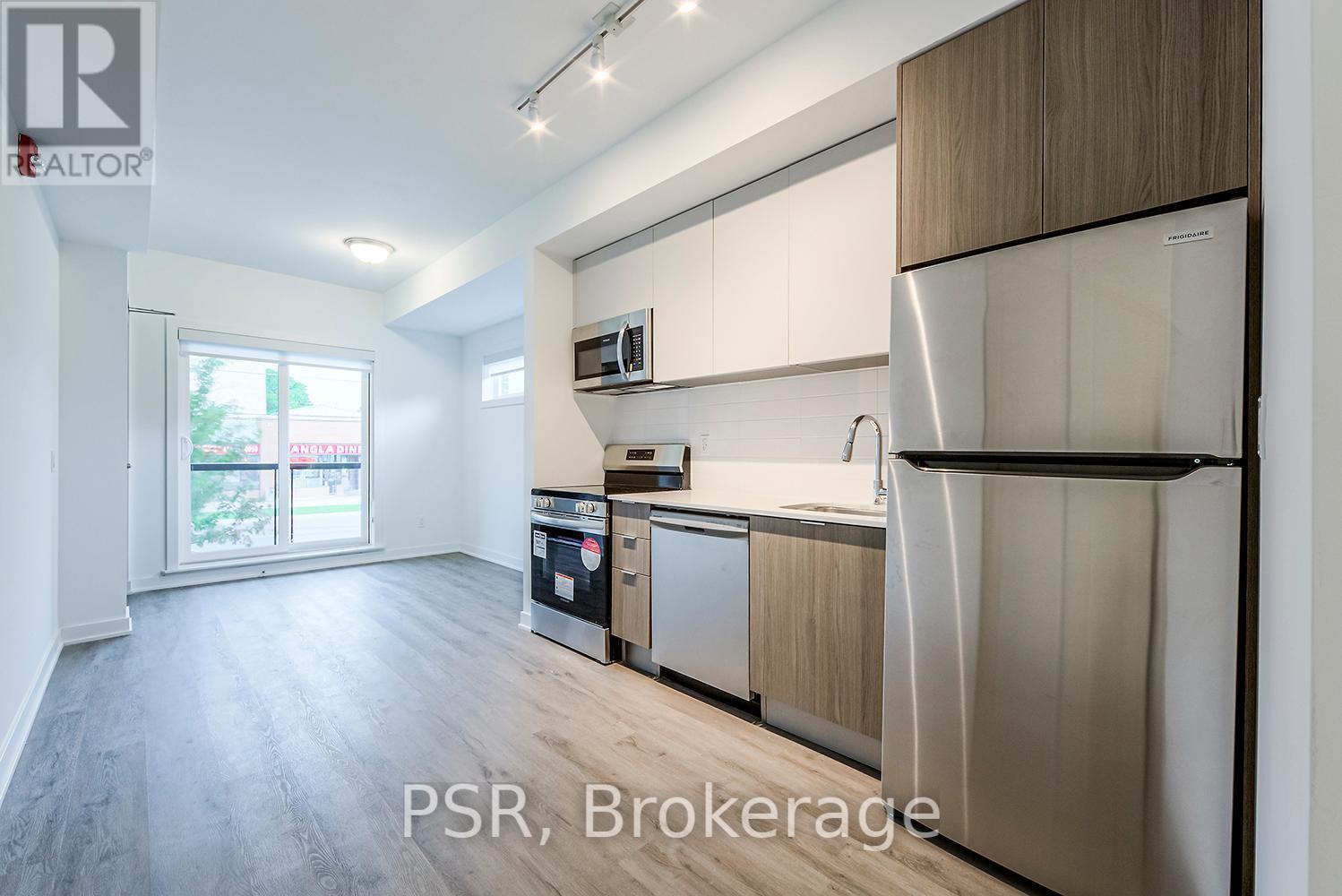 210 - 41 Danforth Road, Toronto, ON - Indoor Photo Showing Kitchen With Stainless Steel Kitchen