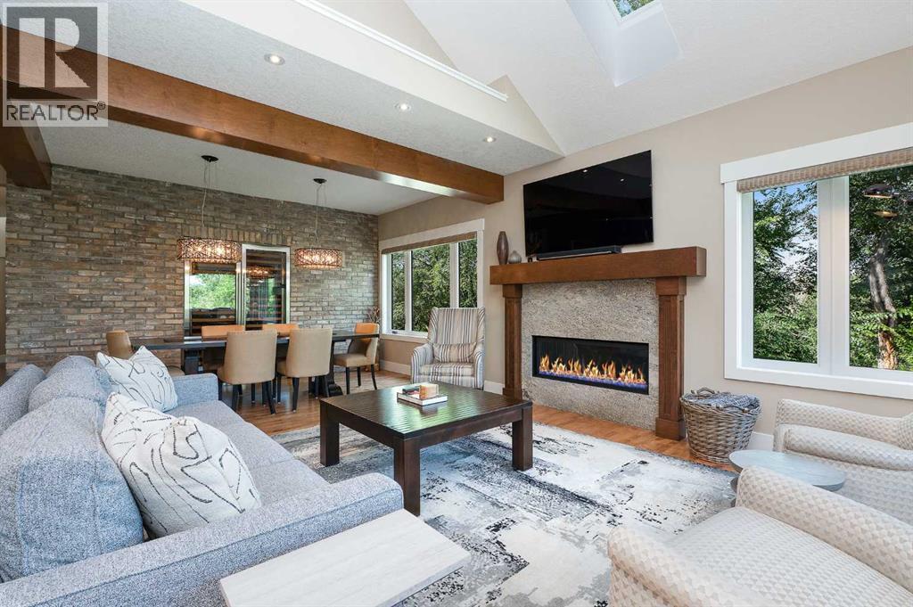 664 29 Avenue Nw, Calgary, AB - Indoor Photo Showing Living Room With Fireplace