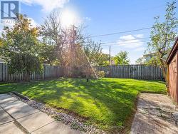 Fenced yard with space to play -