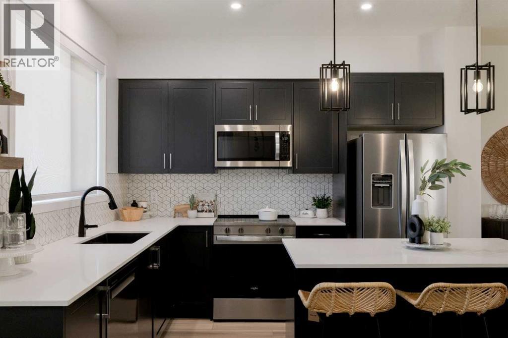 209, 81 Midtown Boulevard Sw, Airdrie, AB - Indoor Photo Showing Kitchen With Upgraded Kitchen