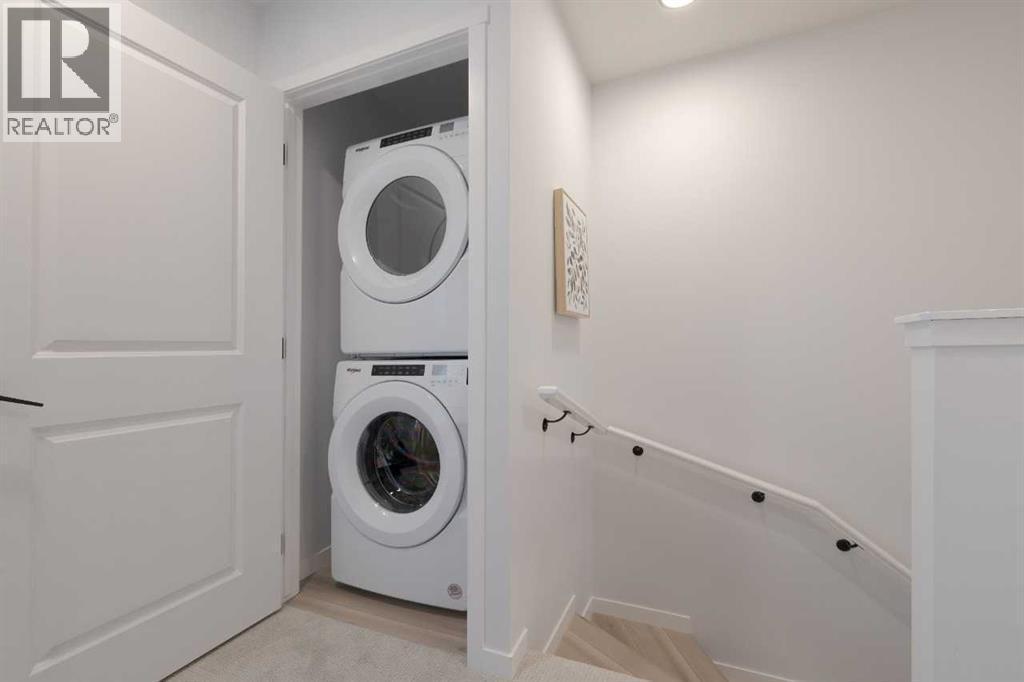209, 81 Midtown Boulevard Sw, Airdrie, AB - Indoor Photo Showing Laundry Room