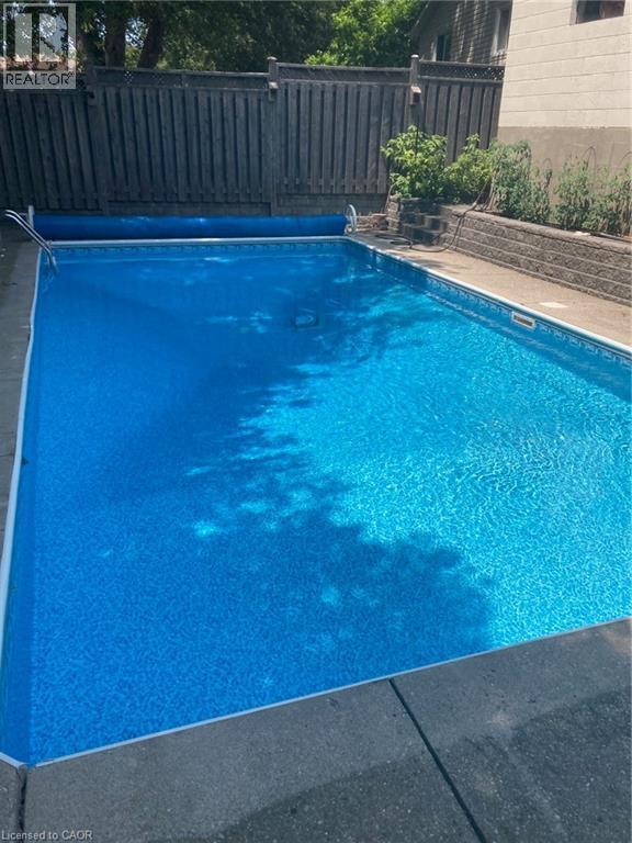 190 Broken Oak Crescent, Kitchener, ON - Outdoor With In Ground Pool With Backyard