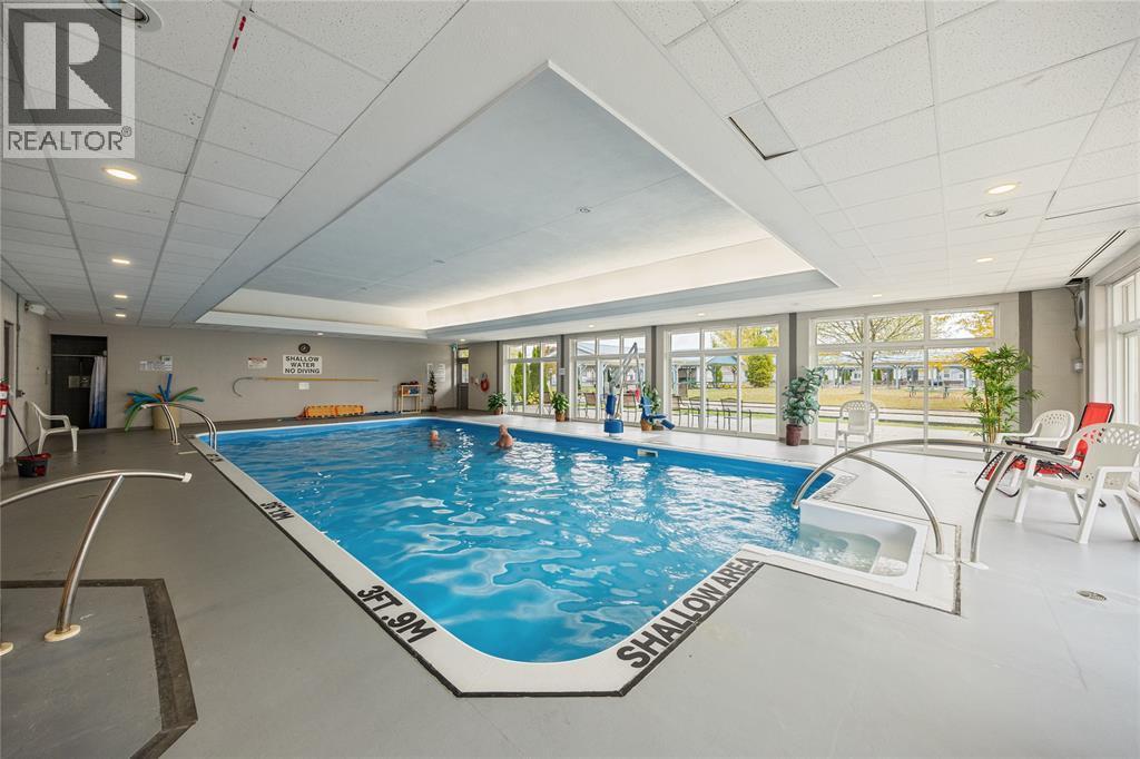 5700 Blackwell Sideroad Unit# 29, Sarnia, ON - Indoor Photo Showing Other Room With In Ground Pool