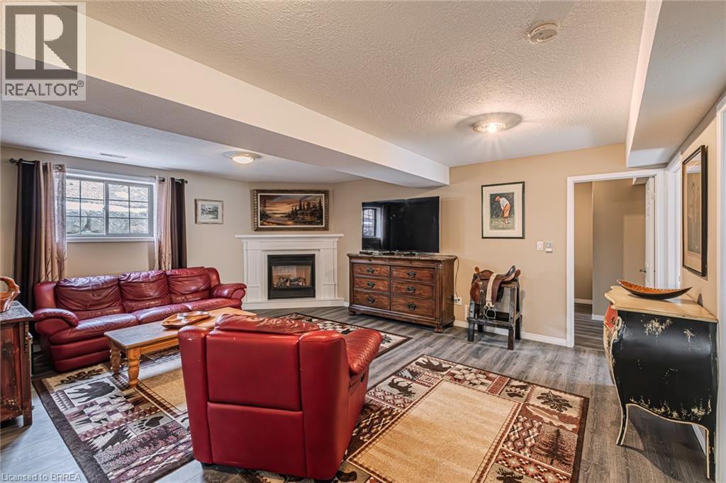 52 Amelia Street, Paris, ON - Indoor Photo Showing Living Room With Fireplace