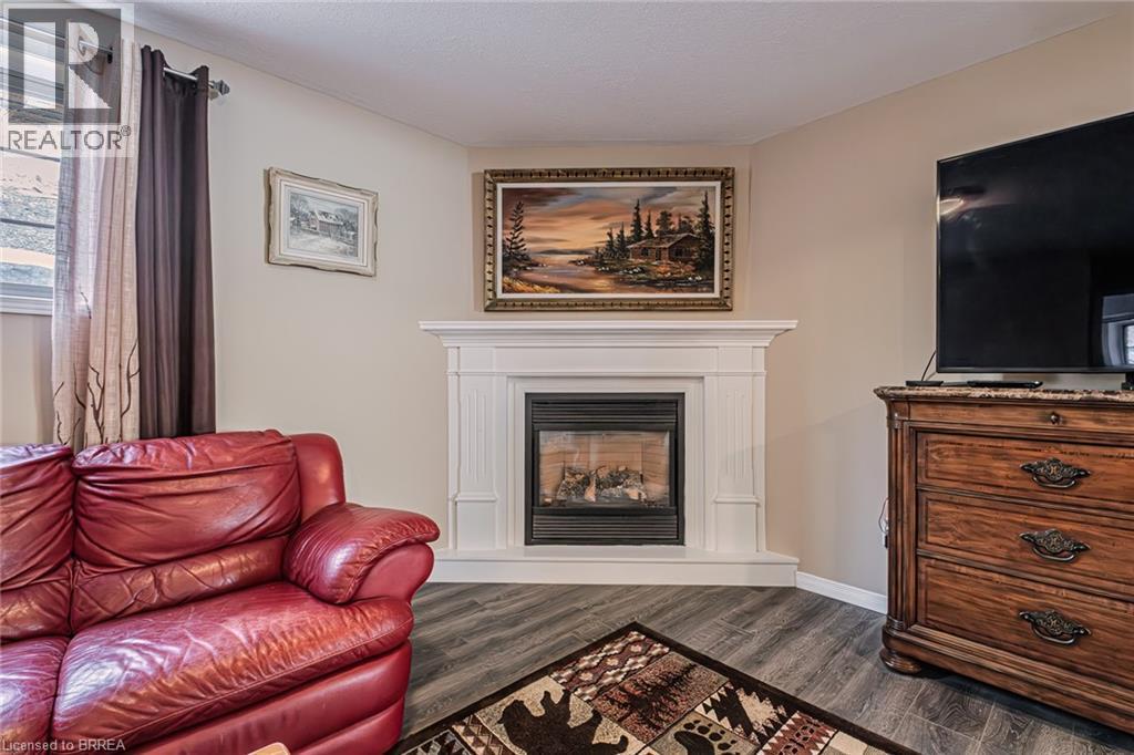 52 Amelia Street, Paris, ON - Indoor Photo Showing Living Room With Fireplace