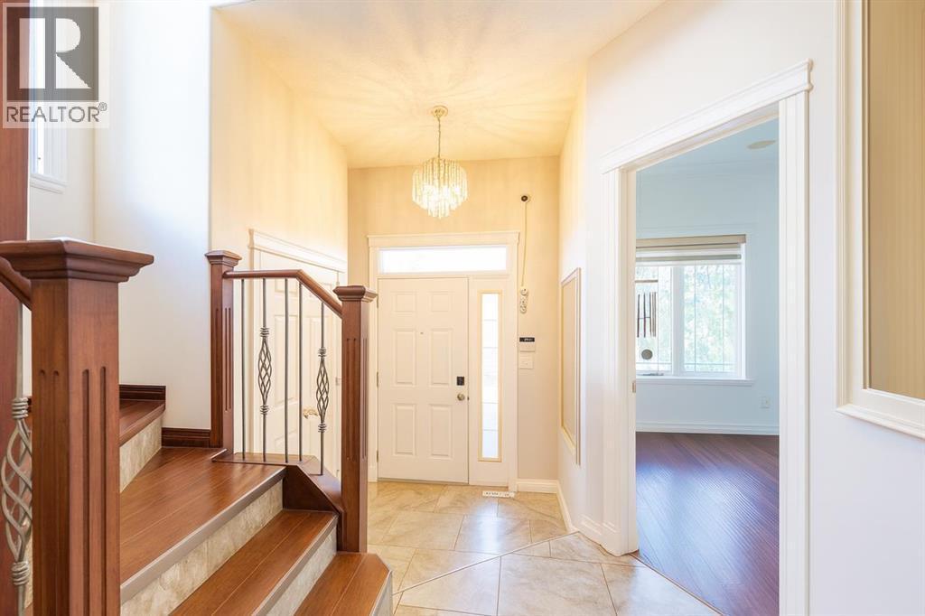 Crystal Chandeliers - 1421 40 Street Sw, Calgary, AB - Indoor Photo Showing Other Room