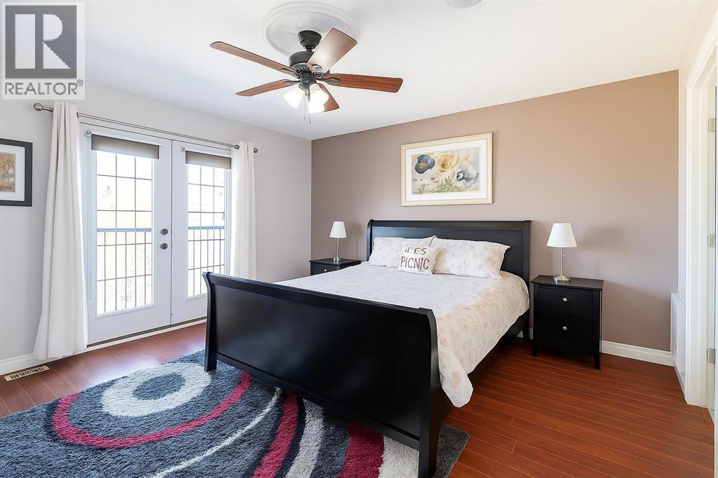 Primary bedroom - 1421 40 Street Sw, Calgary, AB - Indoor Photo Showing Bedroom