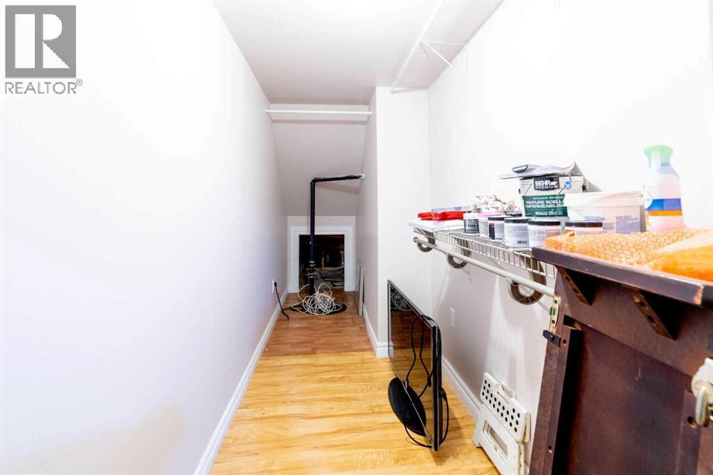 extra storage in basement - 1421 40 Street Sw, Calgary, AB - Indoor Photo Showing Other Room