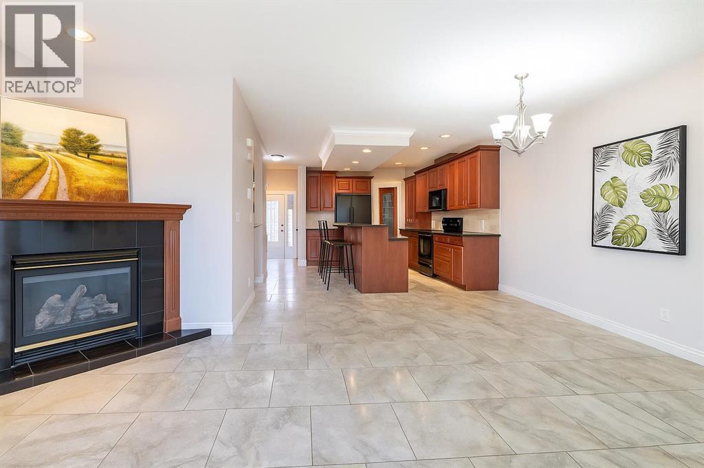 1421 40 Street Sw, Calgary, AB - Indoor Photo Showing Living Room With Fireplace