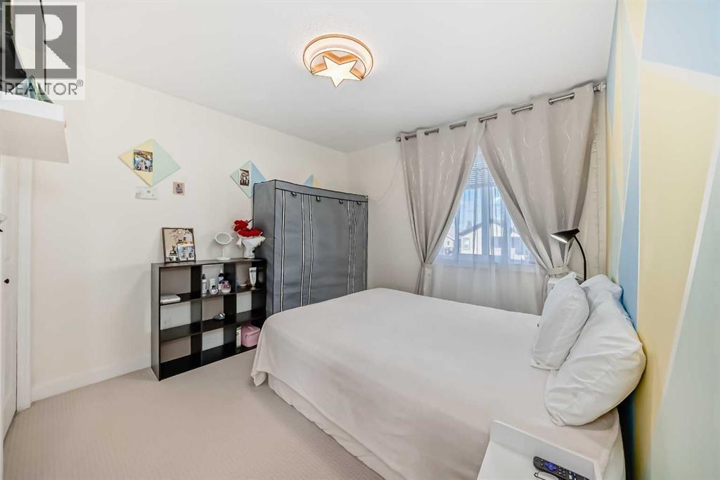 20 Bowman Circle, Sylvan Lake, AB - Indoor Photo Showing Bedroom