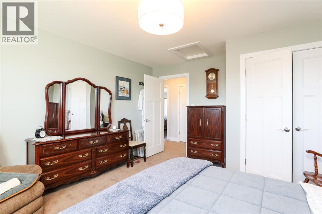 127 Westgate Drive, Coaldale, AB - Indoor Photo Showing Bedroom