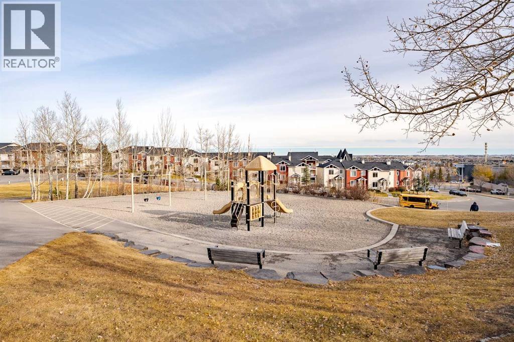 facing to the playground - 122 Panamount Drive Nw, Calgary, AB - Outdoor With View