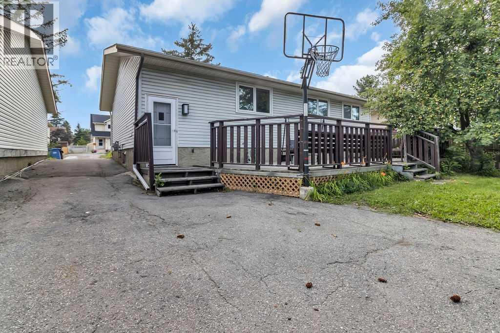 10 Radcliffe Crescent Se, Calgary, AB - Outdoor With Deck Patio Veranda