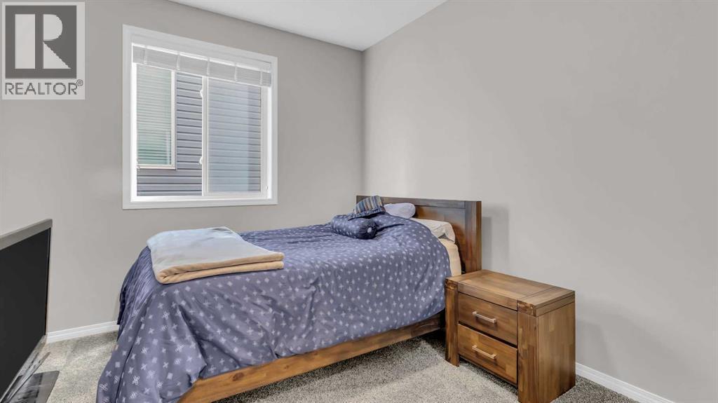 1120 Windhaven Close Sw, Airdrie, AB - Indoor Photo Showing Bedroom