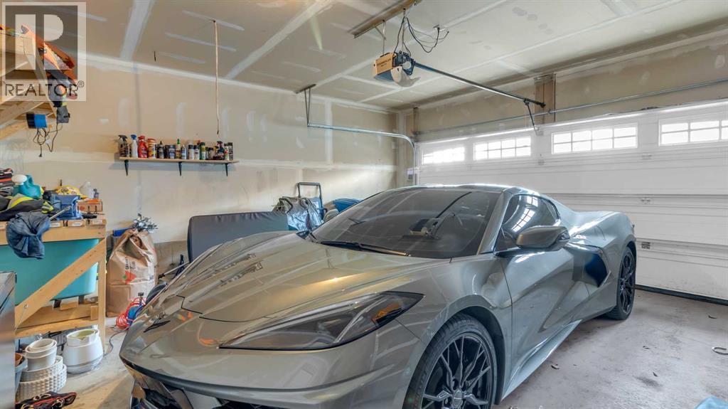 1120 Windhaven Close Sw, Airdrie, AB - Indoor Photo Showing Garage