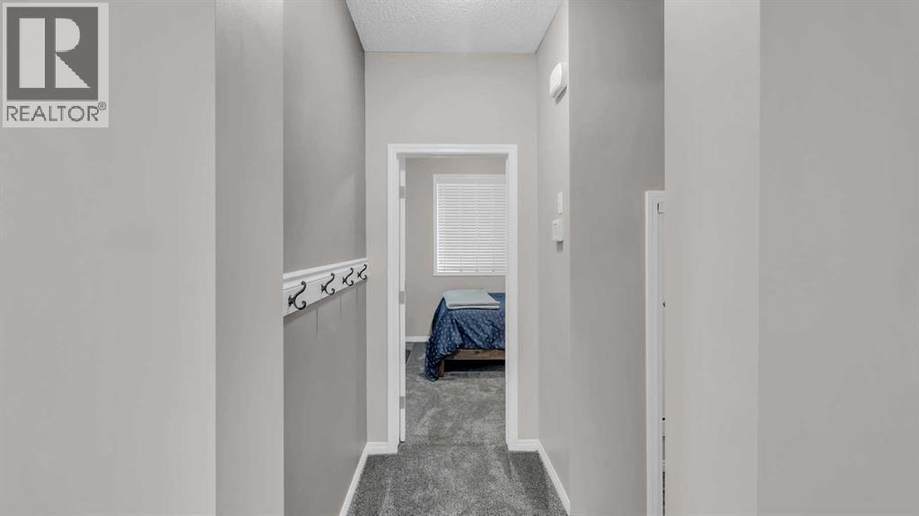 1120 Windhaven Close Sw, Airdrie, AB - Indoor Photo Showing Other Room