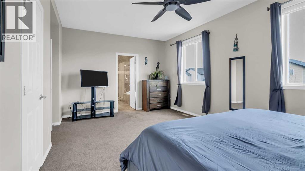 1120 Windhaven Close Sw, Airdrie, AB - Indoor Photo Showing Bedroom