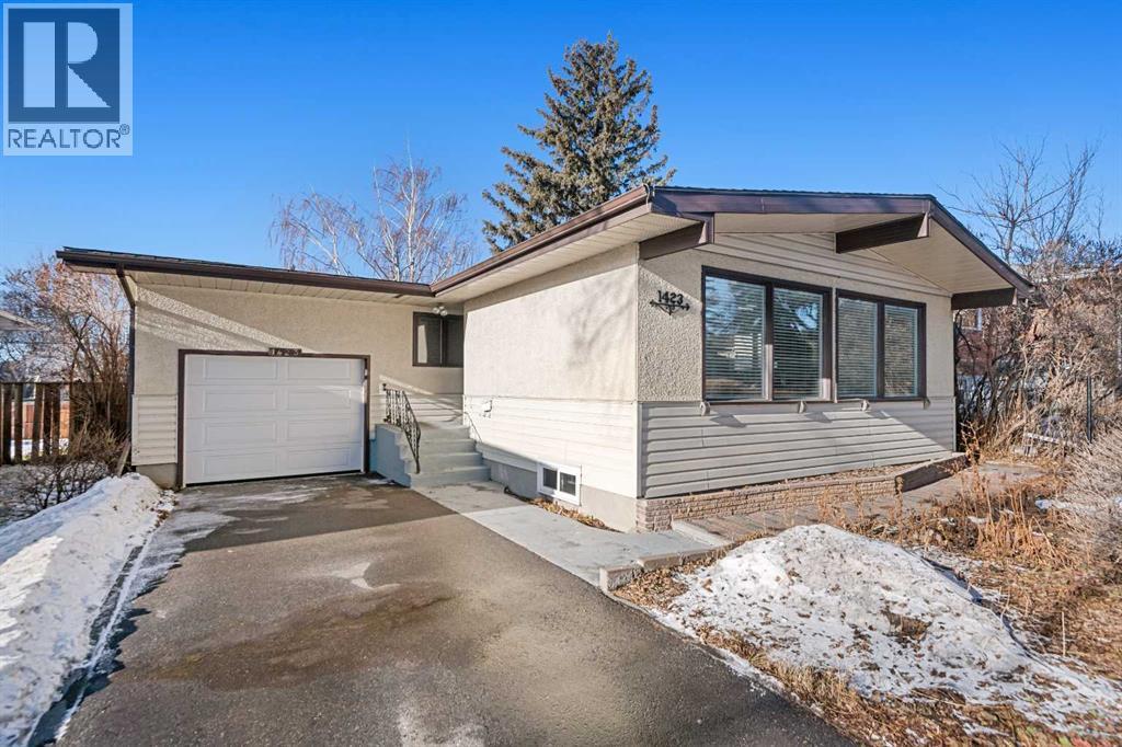 Front Driveway with Clean well maintained garage - 1423 18A Street Ne, Calgary, AB - Outdoor