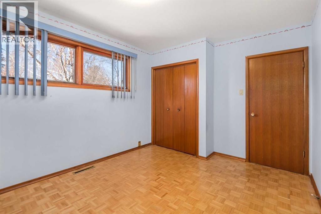 Primary Bedroom - Main Floor - 1423 18A Street Ne, Calgary, AB - Indoor Photo Showing Other Room