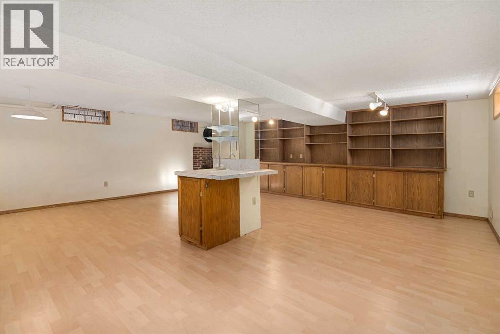Family Room Lower with Wet Bar - 1423 18A Street Ne, Calgary, AB - Indoor