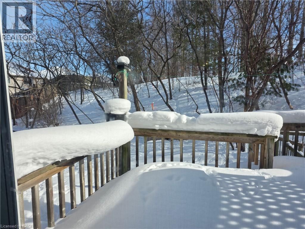 View of snow covered deck - 220 Snowdrop Crescent, Kitchener, ON - Outdoor With Deck Patio Veranda