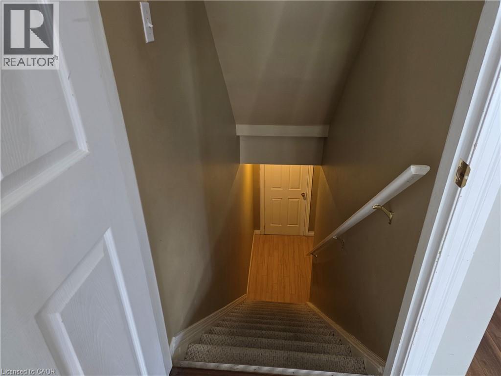 Stairway with baseboards - 220 Snowdrop Crescent, Kitchener, ON - Indoor Photo Showing Other Room
