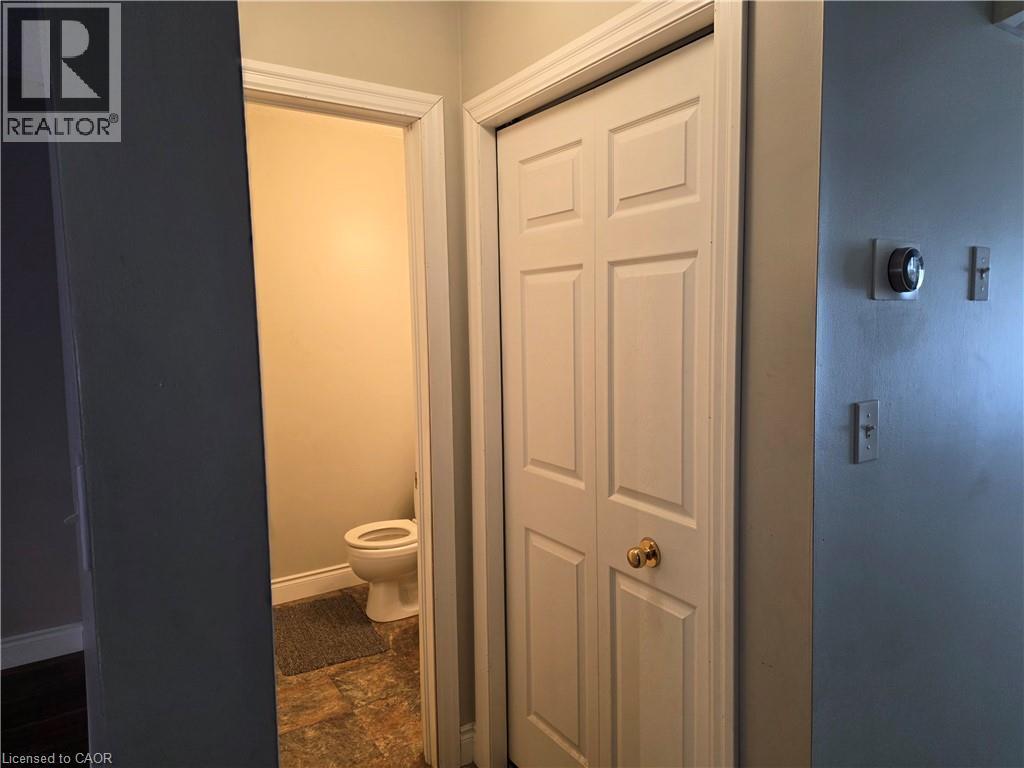 Bathroom featuring a closet and stone finish floors - 220 Snowdrop Crescent, Kitchener, ON - Indoor Photo Showing Other Room