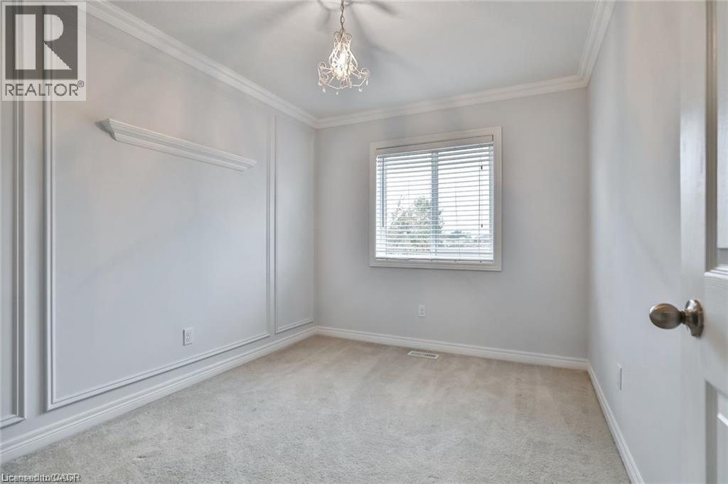 Empty room featuring carpet flooring and crown molding - 42 Madonna Drive, Hamilton, ON - Indoor Photo Showing Other Room