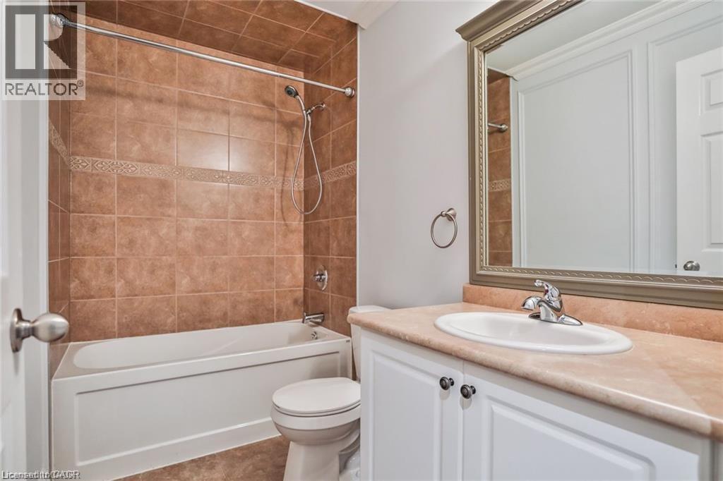 Full bath featuring bathing tub / shower combination and vanity - 42 Madonna Drive, Hamilton, ON - Indoor Photo Showing Bathroom