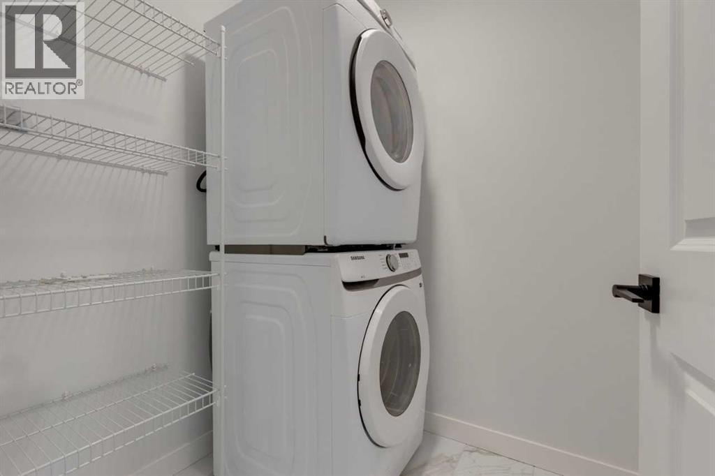 367 Fireside Drive, Cochrane, AB - Indoor Photo Showing Laundry Room