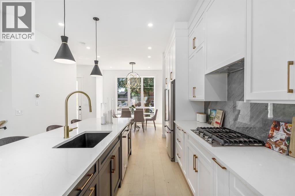 Sample from Developer's past project - 2902 14 Avenue, Calgary, AB - Indoor Photo Showing Kitchen With Upgraded Kitchen