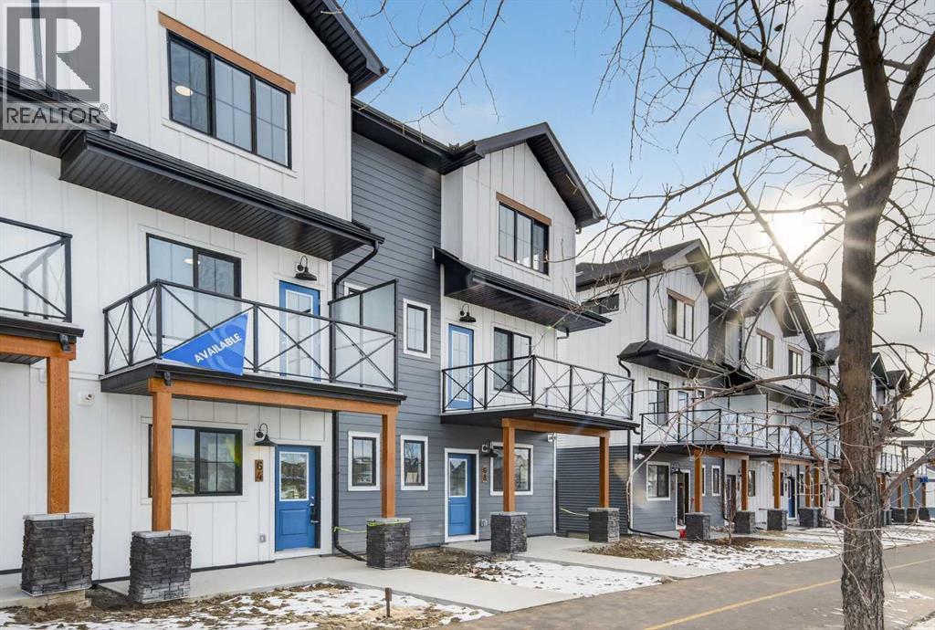 Front of home - 64 Creekside Drive Sw, Calgary, AB - Outdoor With Facade