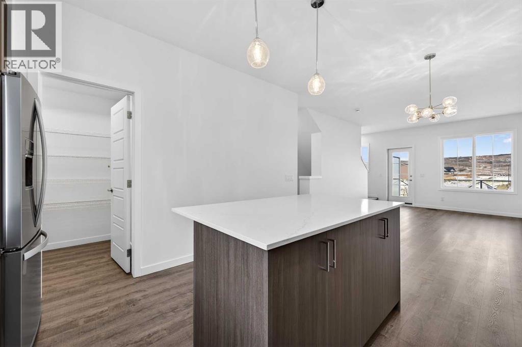 Kitchen - 64 Creekside Drive Sw, Calgary, AB - Indoor Photo Showing Kitchen