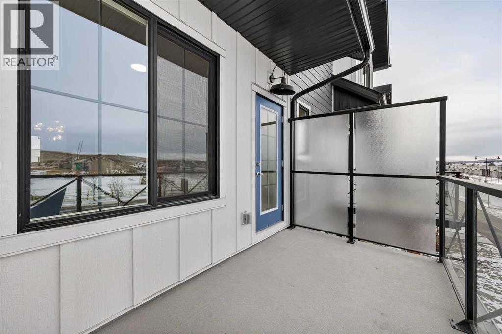 Private balcony - 64 Creekside Drive Sw, Calgary, AB - Outdoor With Balcony With Exterior