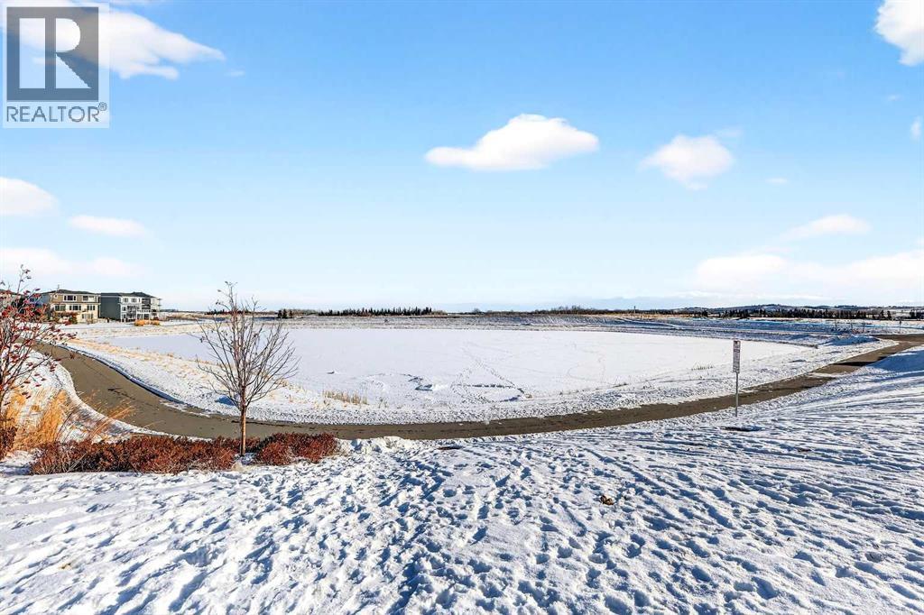Community amenities - 64 Creekside Drive Sw, Calgary, AB - Outdoor With Body Of Water With View