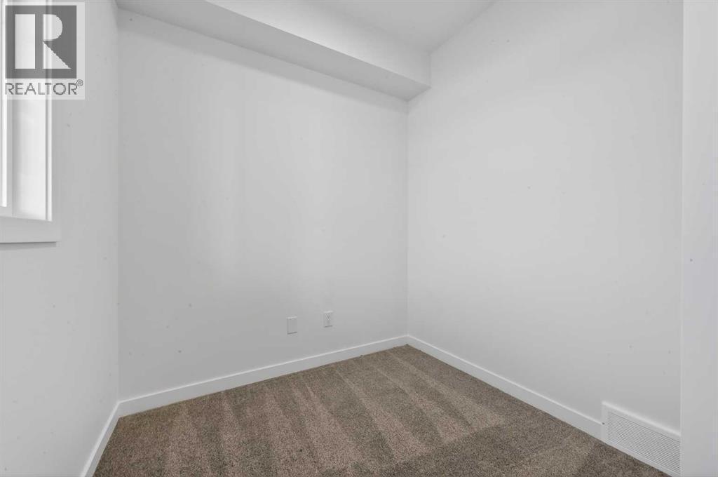 Den/office - 64 Creekside Drive Sw, Calgary, AB - Indoor Photo Showing Other Room