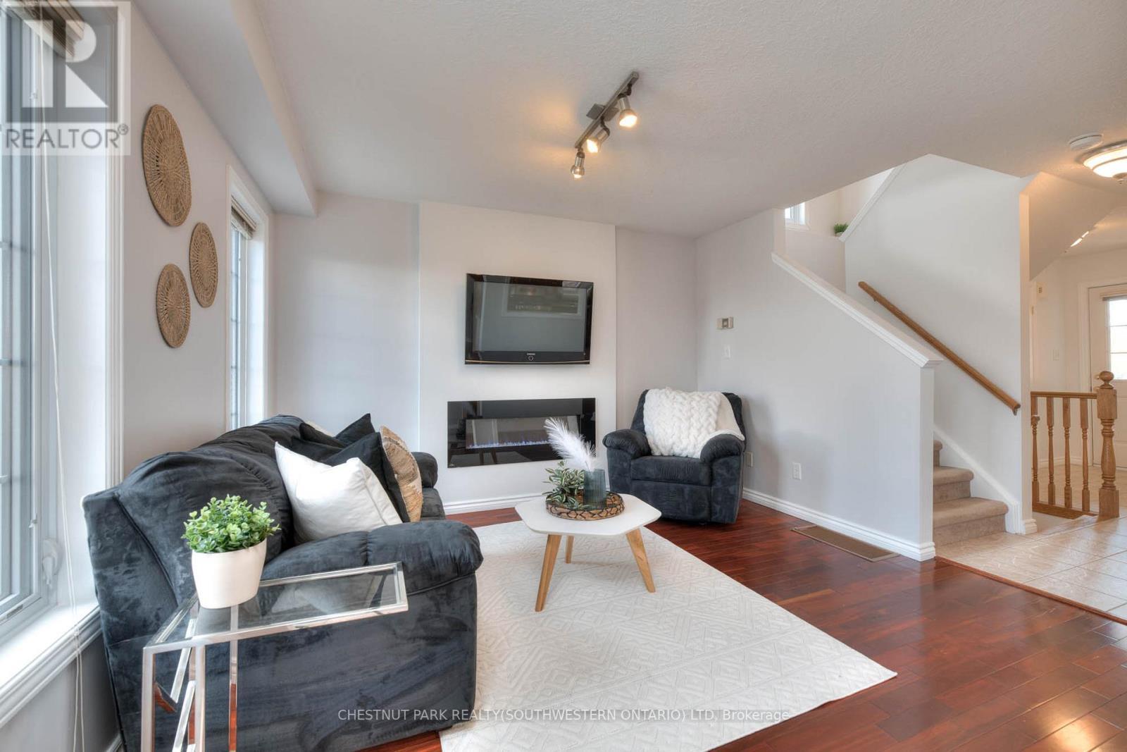 38 Heatherwood Place, Kitchener, ON - Indoor Photo Showing Living Room With Fireplace