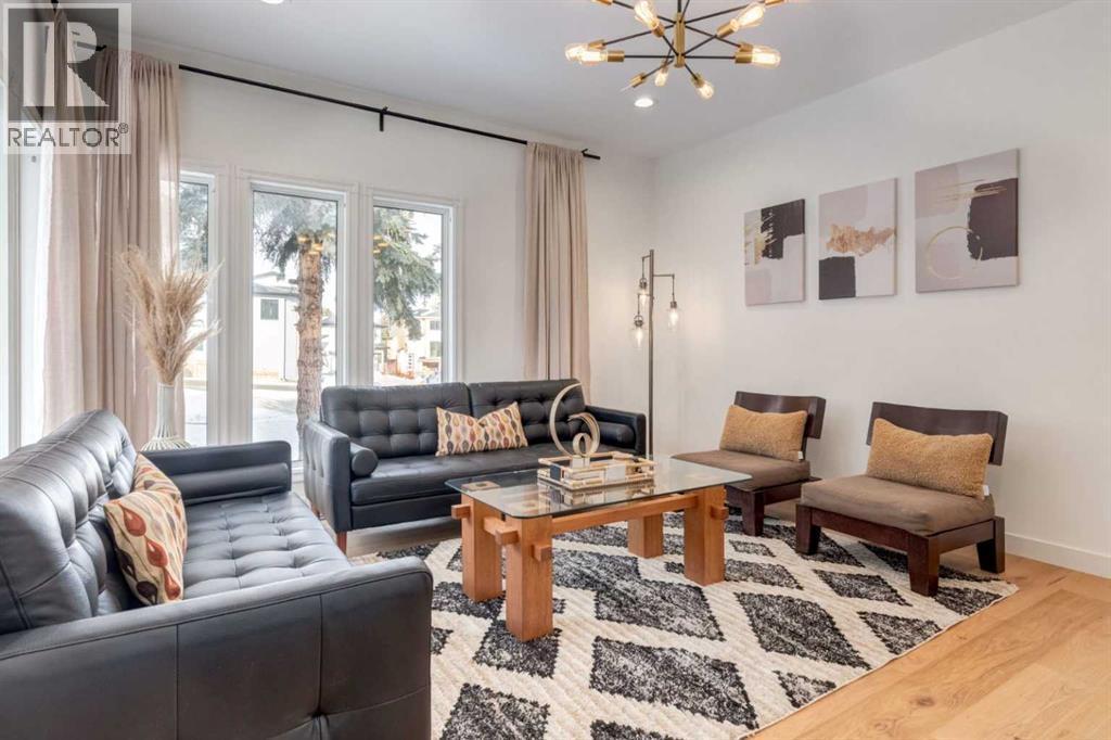 113 Straddock Terrace Sw, Calgary, AB - Indoor Photo Showing Living Room