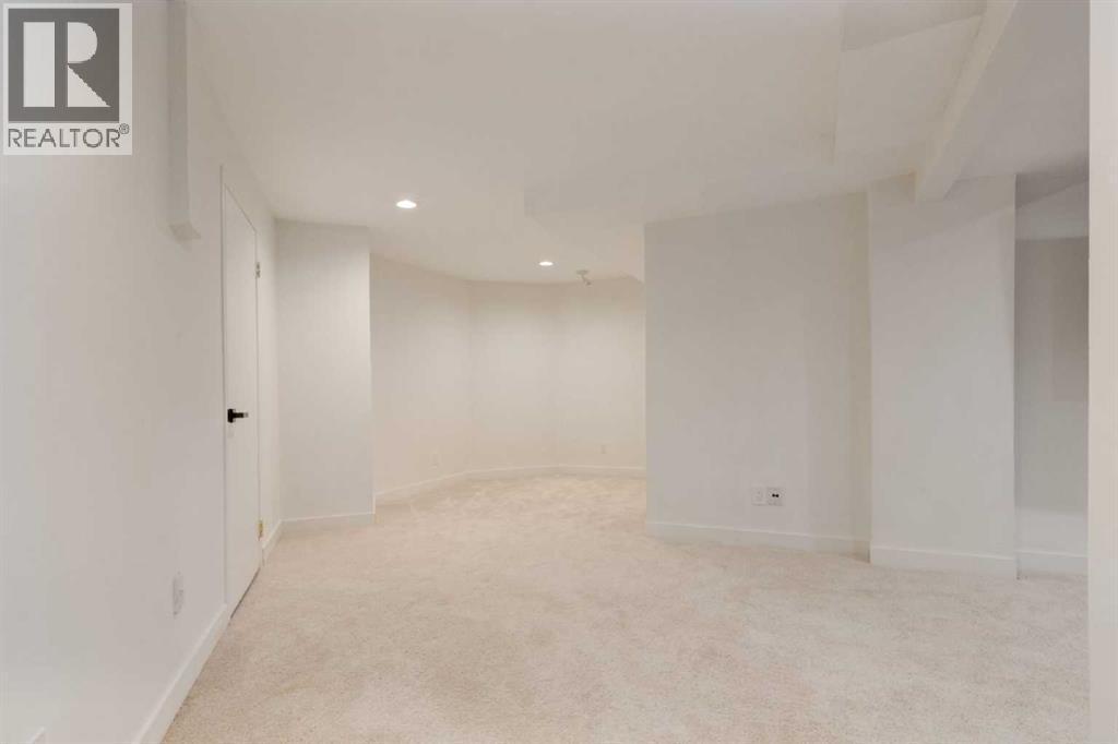 113 Straddock Terrace Sw, Calgary, AB - Indoor Photo Showing Other Room