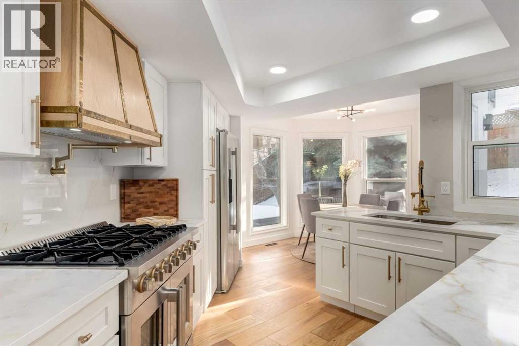 113 Straddock Terrace Sw, Calgary, AB - Indoor Photo Showing Kitchen With Upgraded Kitchen
