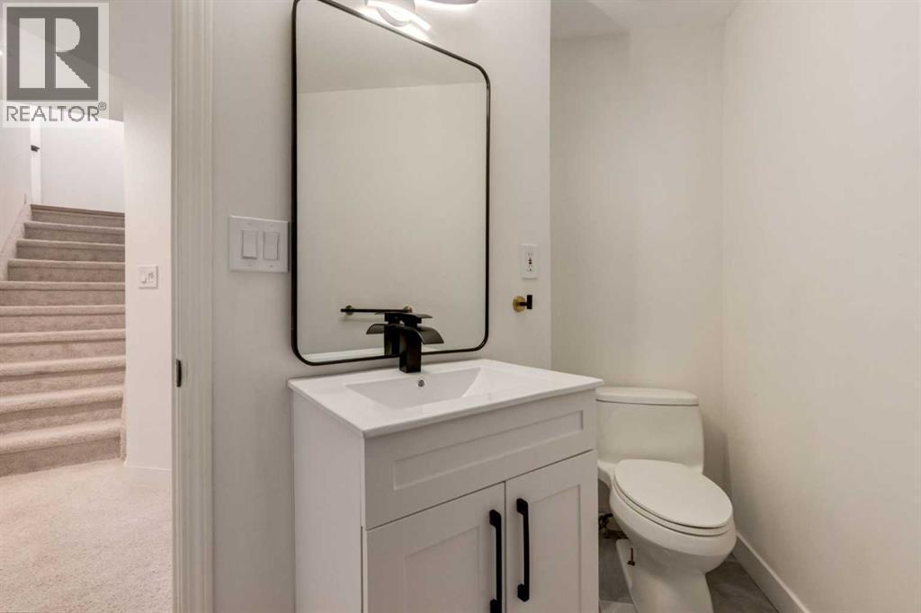 113 Straddock Terrace Sw, Calgary, AB - Indoor Photo Showing Bathroom